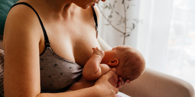 Mother breastfeeding baby