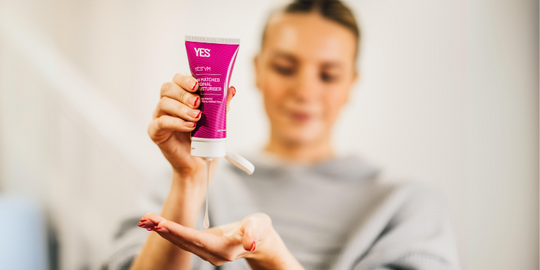 woman holding YES organic vaginal moisturiser 